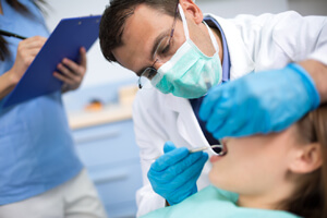 Dentist treating a dental patient