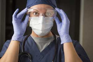 Surgical Nurse preparing for surgery