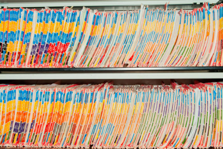 Medical Records folder archive organized in the file cabinet.
