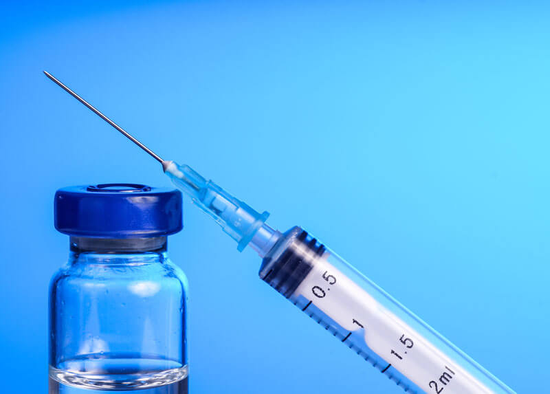 vaccine vile and syringe