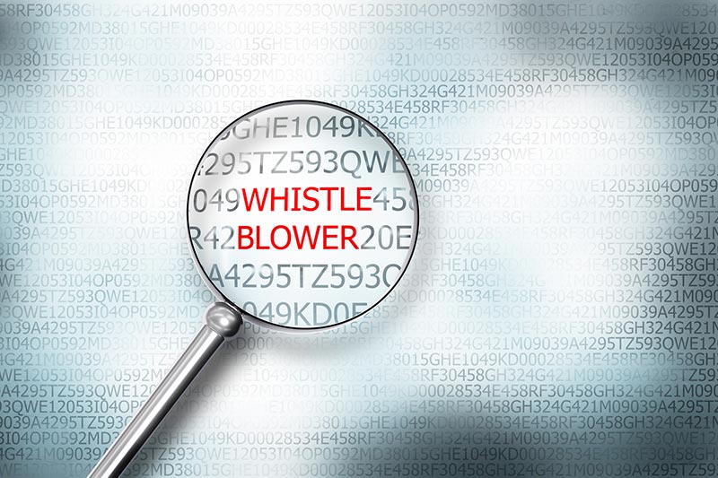 whistleblower under microscope concept
